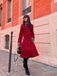 She throws on this 1950s Leopard Patchwork Button Coat and the city feels like 1950s Paris