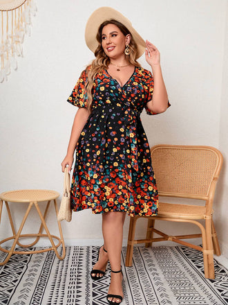 She slips into this 1950s Multicolored Floral Flare Sleeve Dress and suddenly it's a 1950s daydream