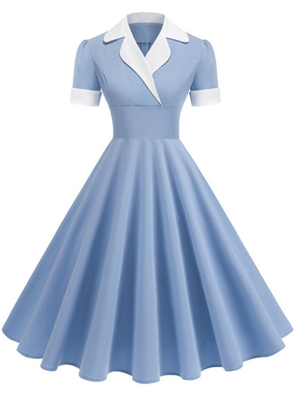She slips into this 1950s Notched Collar Colorblock Swing Dress and suddenly it's a 1950s daydream