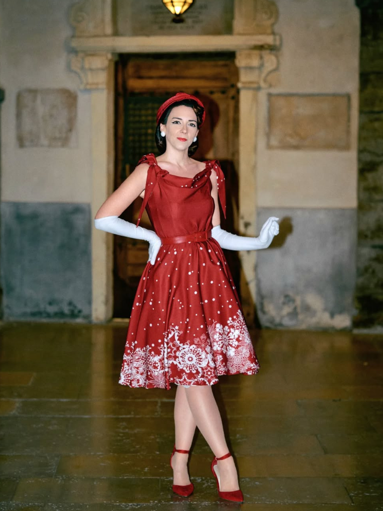 She slips into this 1950s Off-shoulder Snowflake Dress and suddenly it's a 1950s daydream