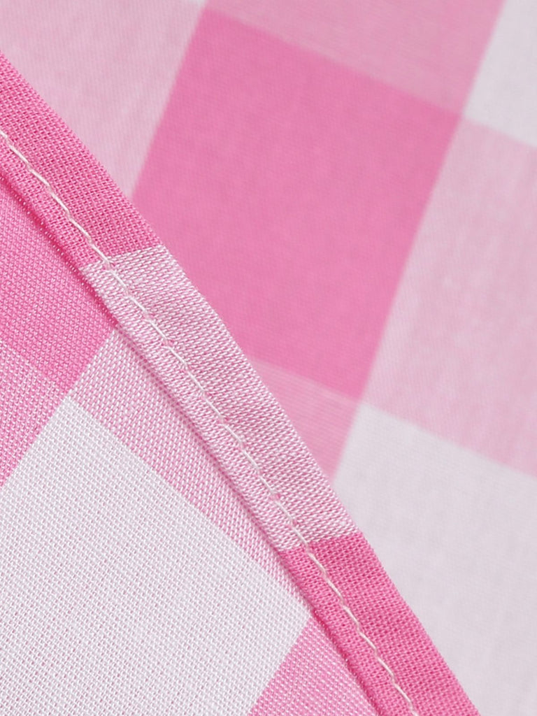She slips into this 1950s Plaid Halter Swing Dress and suddenly it's a 1950s daydream