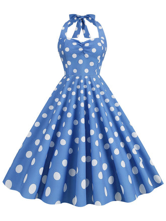 She slips into this 1950s Polka Dot Halter Swing Dress and suddenly it's a 1950s daydream