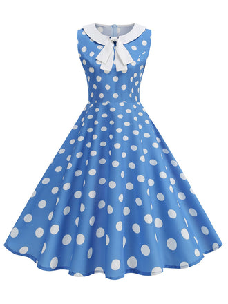 She slips into this 1950s Polka Dot Peter Pan Collar Sleeveless Dress and suddenly it's a 1950s daydream