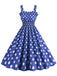She slips into this 1950s Polka Dot Smocking Strap Dress and suddenly it's a 1950s daydream