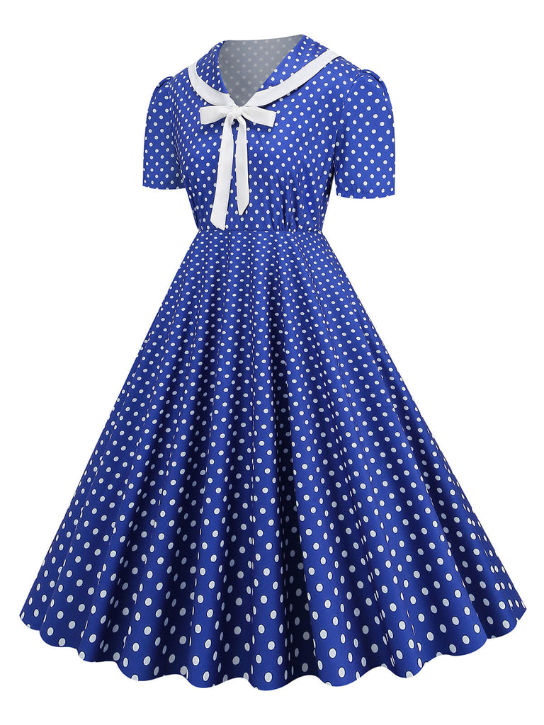 This 1950s Polka Dots Lapel Bowknot Swing Dress wraps her in 1950s elegance, one twirl at a time