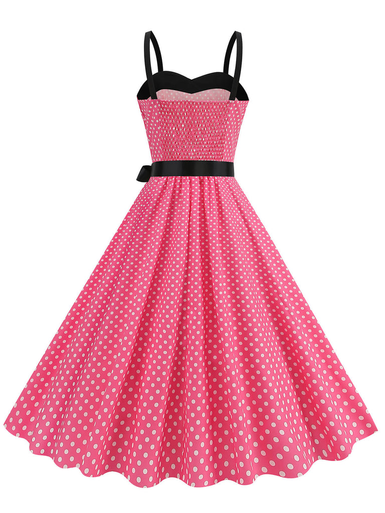 This 1950s Polka Dots Patchwork Ribbon Strap Dress wraps her in 1950s elegance, one twirl at a time