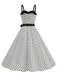 She slips into this 1950s Polka Dots Patchwork Ribbon Strap Dress and suddenly it's a 1950s daydream