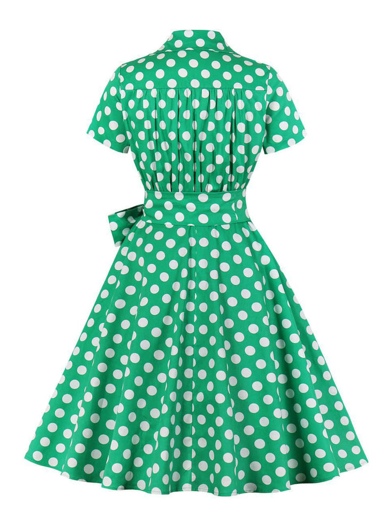 She slips into this 1950s Polka Dots Waist Tie Lapel Dress and suddenly it's a 1950s daydream
