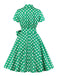 She slips into this 1950s Polka Dots Waist Tie Lapel Dress and suddenly it's a 1950s daydream