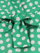 This 1950s Polka Dots Waist Tie Lapel Dress wraps her in 1950s elegance, one twirl at a time