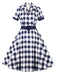 This 1950s Retro Contrast Short-Sleeved Lapel Dress wraps her in 1950s elegance, one twirl at a time