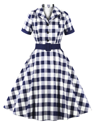 She slips into this 1950s Retro Contrast Short-Sleeved Lapel Dress and suddenly it's a 1950s daydream