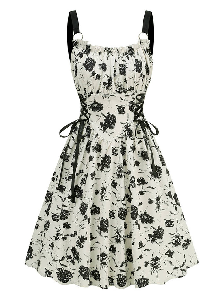 She slips into this 1950s Roses Straps Lace-Up Pleated Dress and suddenly it's a 1950s daydream