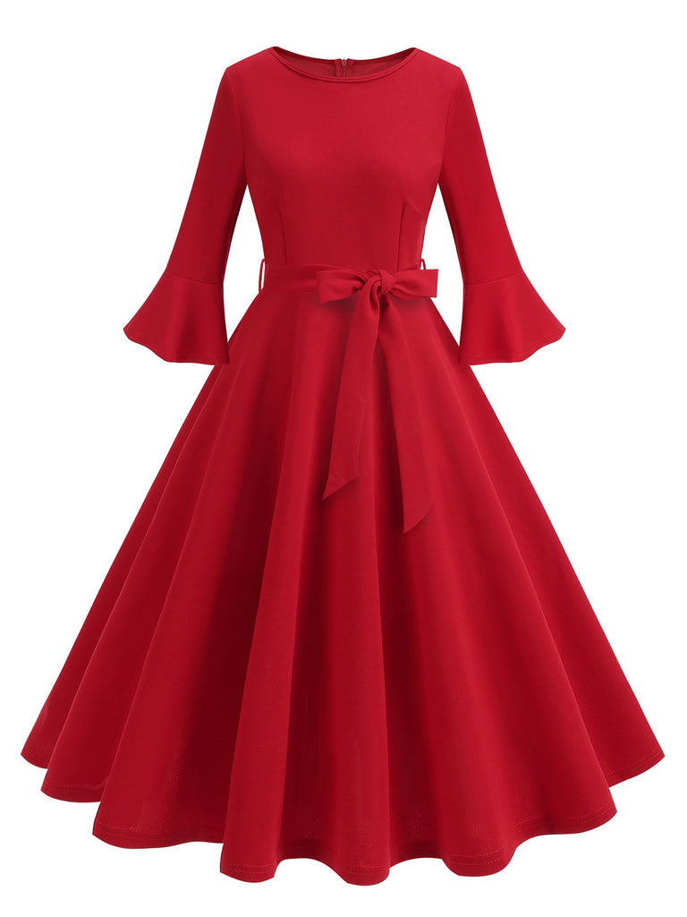 She slips into this 1950s Solid Bell Sleeves Swing Dress and suddenly it's a 1950s daydream