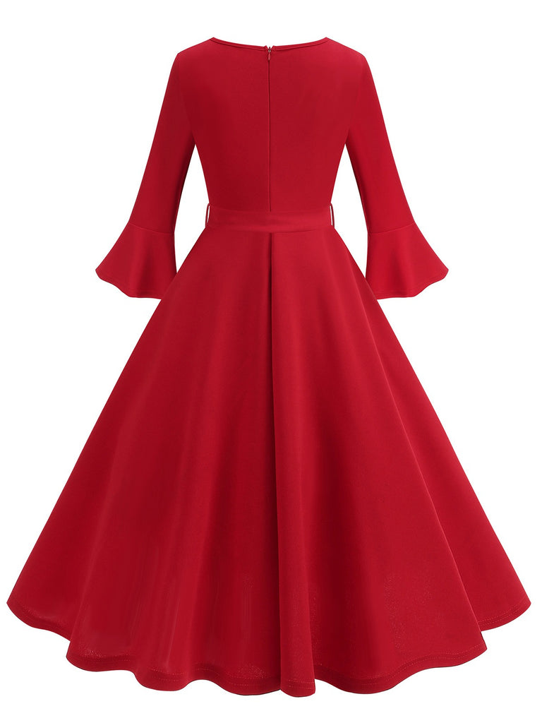 This 1950s Solid Bell Sleeves Swing Dress wraps her in 1950s elegance, one twirl at a time