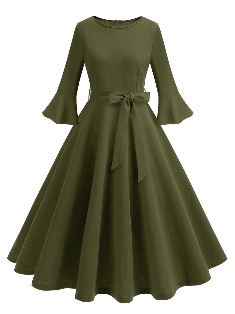 She slips into this 1950s Solid Bell Sleeves Swing Dress and suddenly it's a 1950s daydream