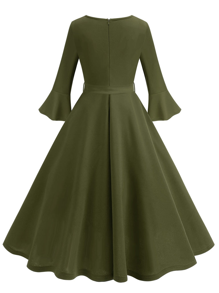 This 1950s Solid Bell Sleeves Swing Dress wraps her in 1950s elegance, one twirl at a time