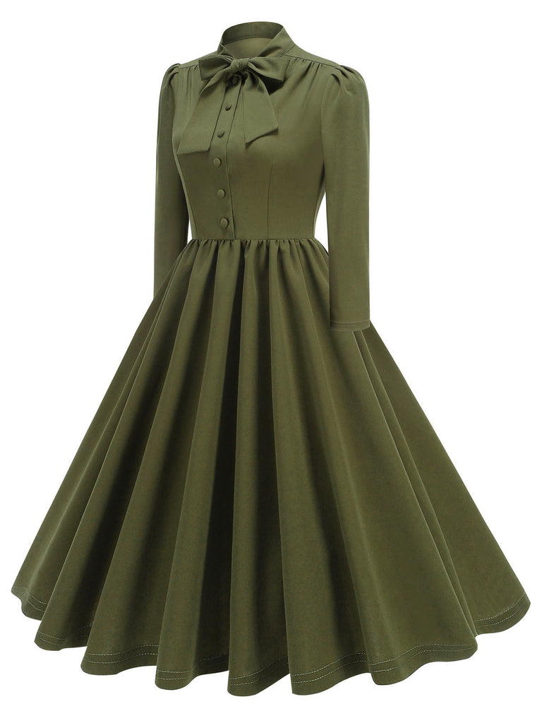 1950s Solid Bow Collar Buttoned Swing Dress — a 1950s silhouette that turns sidewalks into runways