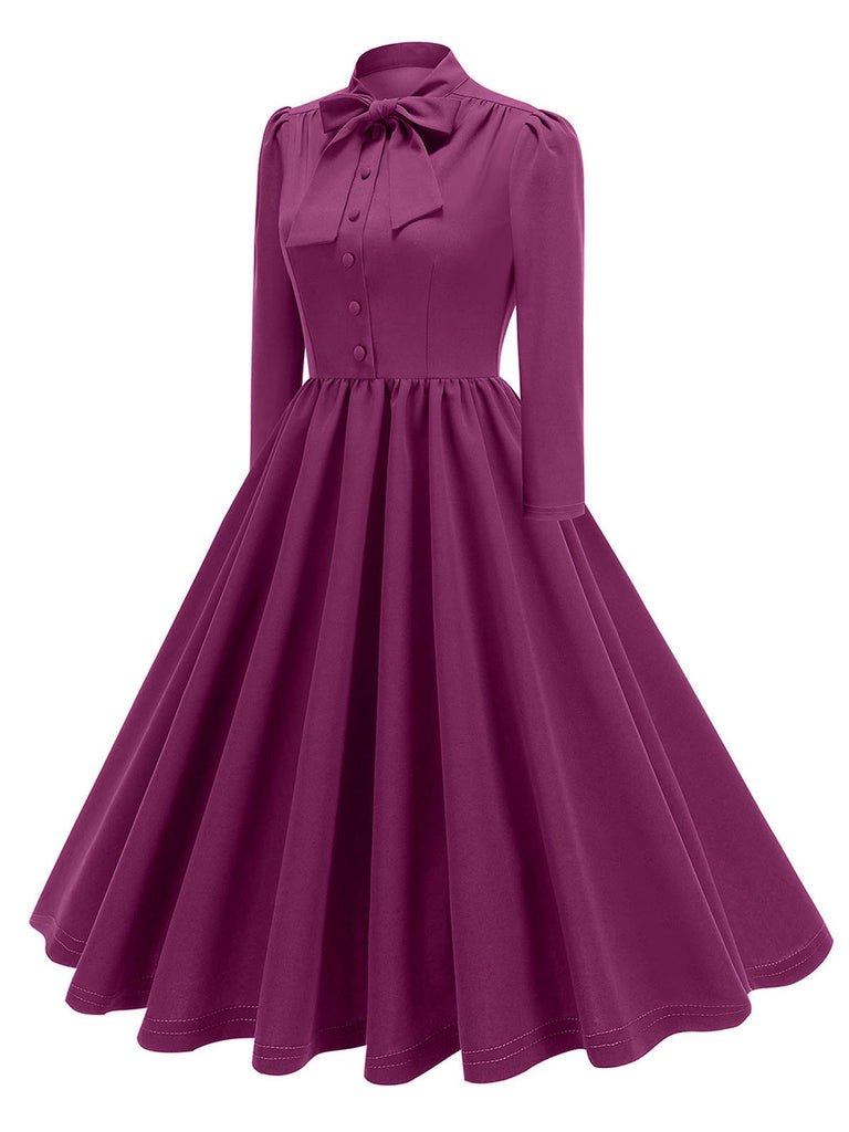 This 1950s Solid Bow Collar Buttoned Swing Dress wraps her in 1950s elegance, one twirl at a time
