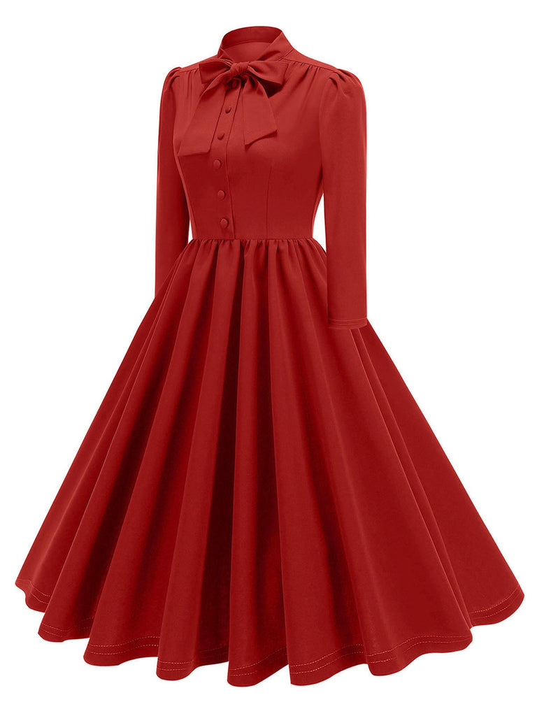 This 1950s Solid Bow Collar Buttoned Swing Dress wraps her in 1950s elegance, one twirl at a time