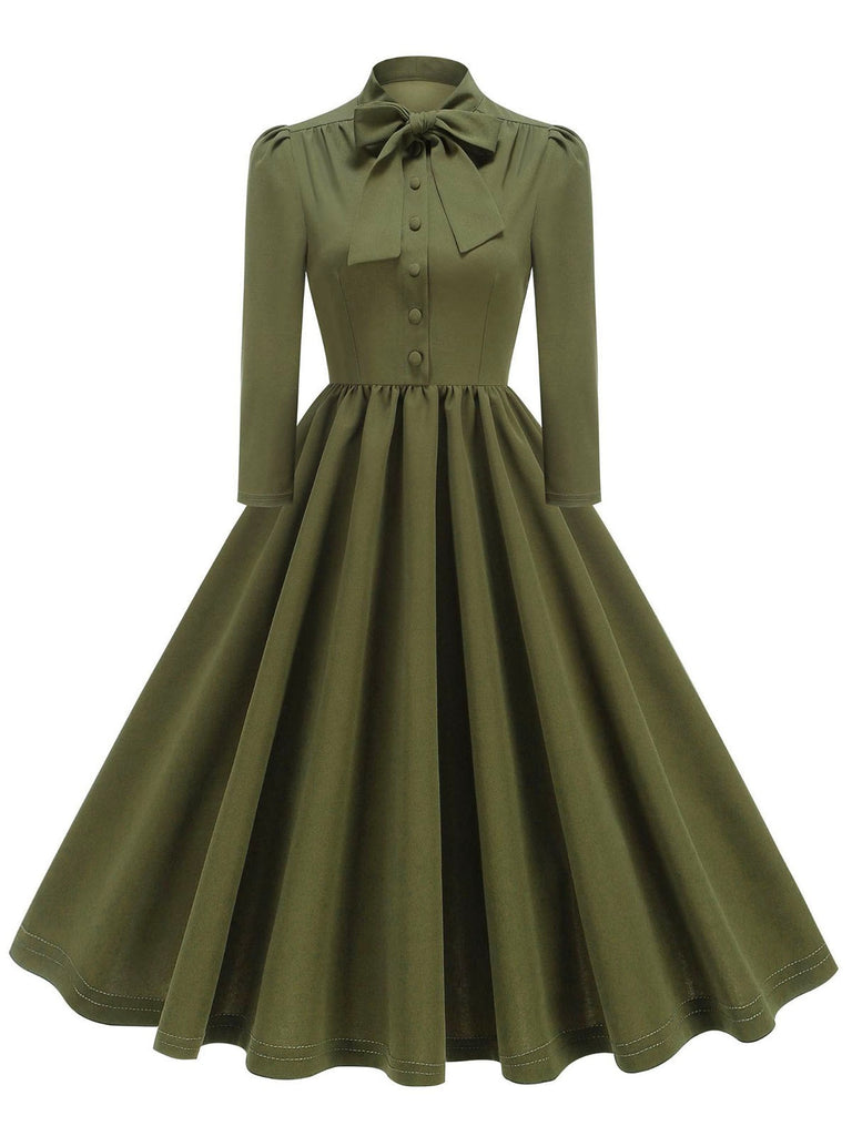 This 1950s Solid Bow Collar Buttoned Swing Dress wraps her in 1950s elegance, one twirl at a time