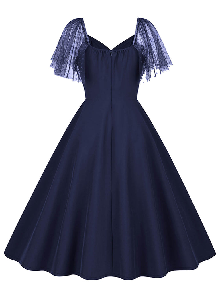 1950s Solid Dots Mesh Sleeve V-Neck Dress — a 1950s silhouette that turns sidewalks into runways