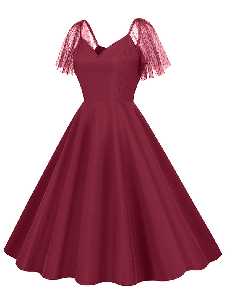 She slips into this 1950s Solid Dots Mesh Sleeve V-Neck Dress and suddenly it's a 1950s daydream