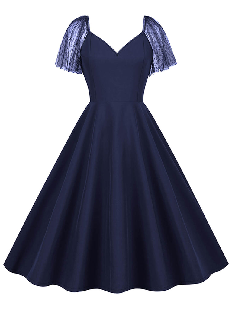1950s Solid Dots Mesh Sleeve V-Neck Dress — the kind of 1950s dress that makes strangers smile