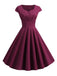 She slips into this 1950s Solid Heart Neck Short Sleeve Dress and suddenly it's a 1950s daydream