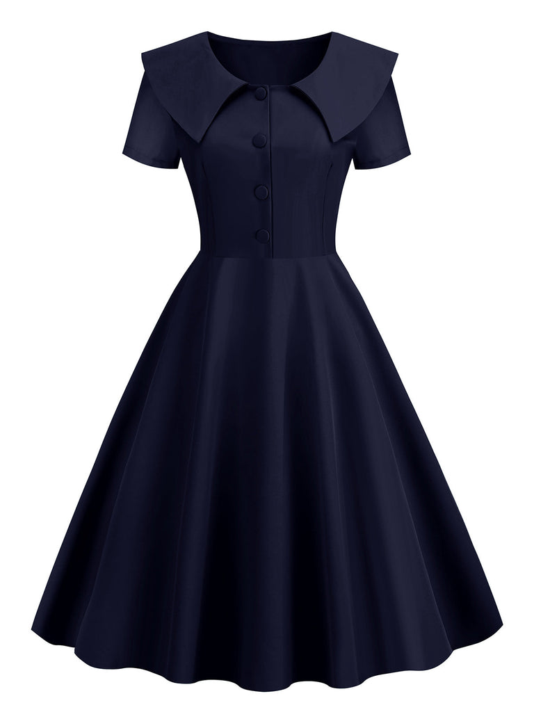 She slips into this 1950s Solid Lapel Swing Dress and suddenly it's a 1950s daydream