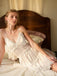 She slips into this 1950s Solid Wrinkle Spaghetti Straps Nightgown and suddenly it's a 1950s daydream