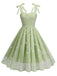 This 1950s Spaghetti Strap Bow Leaves Mesh Dress wraps her in 1950s elegance, one twirl at a time