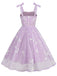 This 1950s Spaghetti Strap Bow Leaves Mesh Dress wraps her in 1950s elegance, one twirl at a time