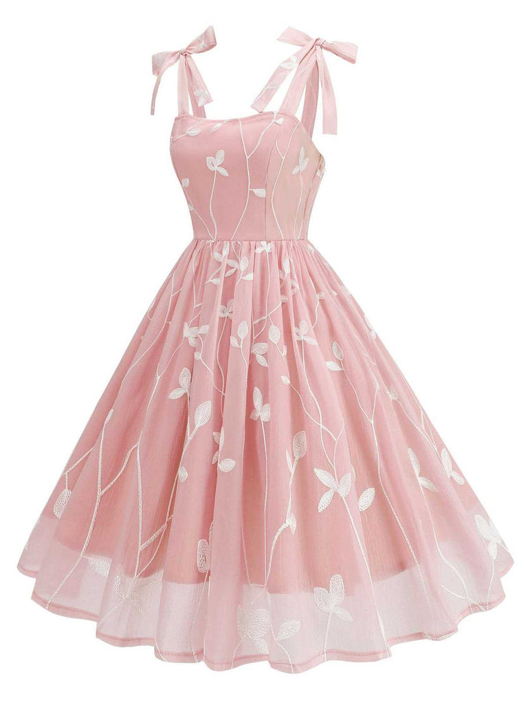 She slips into this 1950s Spaghetti Strap Bow Leaves Mesh Dress and suddenly it's a 1950s daydream