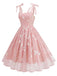 She slips into this 1950s Spaghetti Strap Bow Leaves Mesh Dress and suddenly it's a 1950s daydream