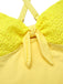 This 1950s Spaghetti Strap Cross-Back One-Piece Swimsuit carries 1950s vacation dreams in every stitch