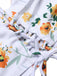 1950s Spaghetti Strap Floral Swimsuit — because 1950s glamour never goes out of style