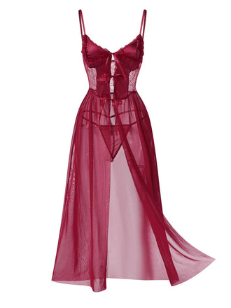 She slips into this 1950s Spaghetti Strap Sheer Lace Satin Bow Nightgown and suddenly it's a 1950s daydream