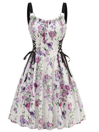 She slips into this 1950s Strap Floral Butterflies Lace-Up Corset Dress and suddenly it's a 1950s daydream
