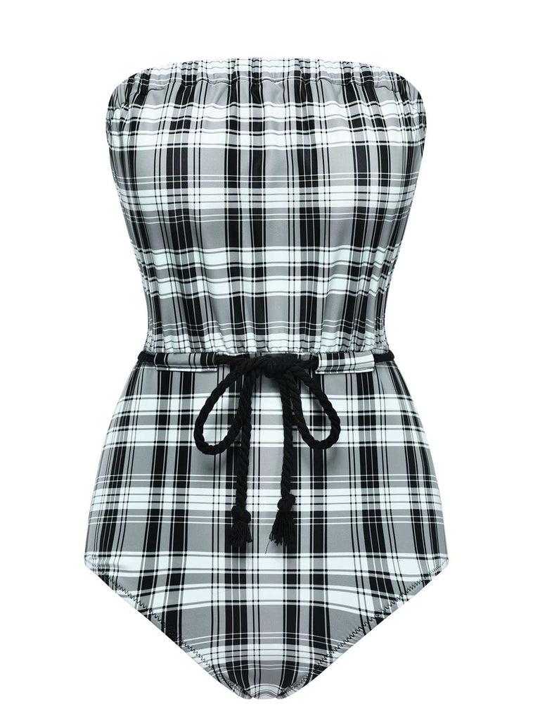 She's wearing 1950s Strapless Plaids One-Piece Swimsuit and the whole beach remembers the 1950s