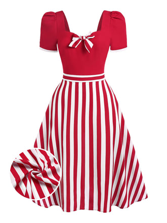 She slips into this 1950s Striped Bow Dress and suddenly it's a 1950s daydream