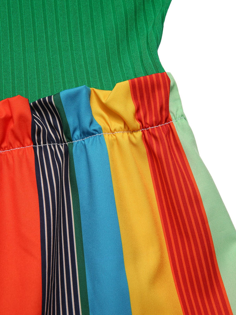 She adds this 1950s Stripes Knitted Belted Jumpsuit and suddenly it's 1950s perfection