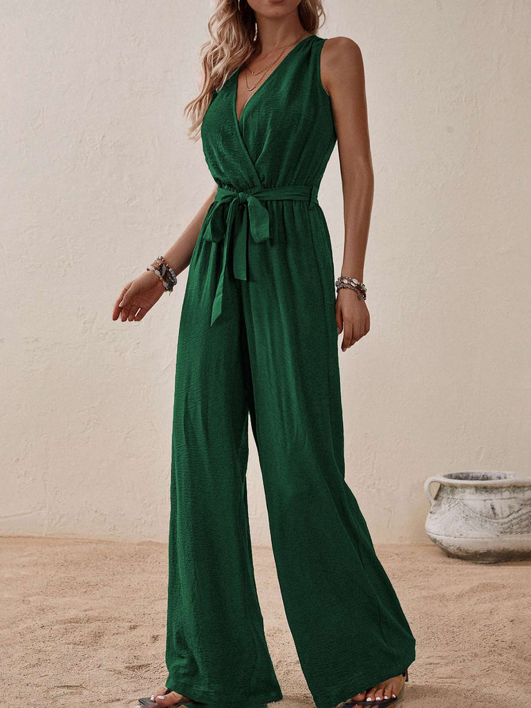 She adds this 1950s Surplice V-Neck Solid Belted Jumpsuit and suddenly it's 1950s perfection