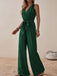 She adds this 1950s Surplice V-Neck Solid Belted Jumpsuit and suddenly it's 1950s perfection