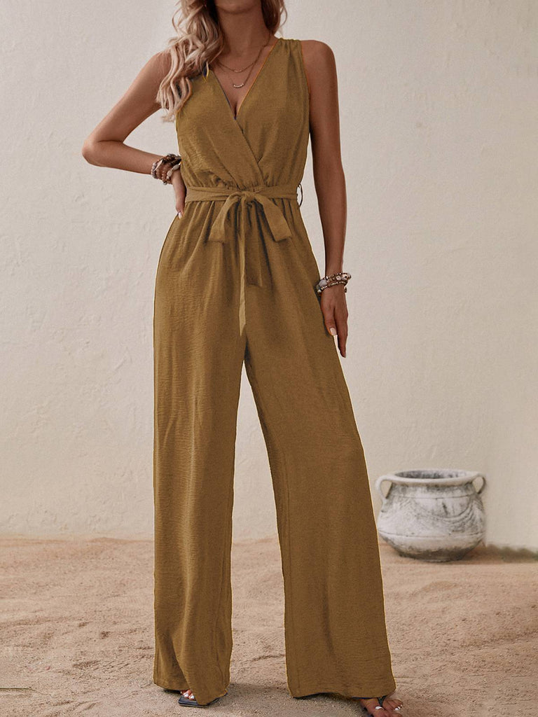 1950s Surplice V-Neck Solid Belted Jumpsuit — the 1950s finishing touch that makes her outfit sing