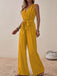 She adds this 1950s Surplice V-Neck Solid Belted Jumpsuit and suddenly it's 1950s perfection