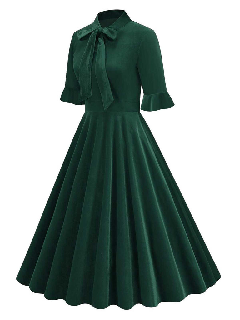 This 1950s Tie Neck Velvet Flared Sleeve Dress wra