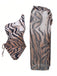 She's wearing 1950s Tiger One-Shoulder Swimsuit & Cover-Up and the whole beach remembers the 1950s