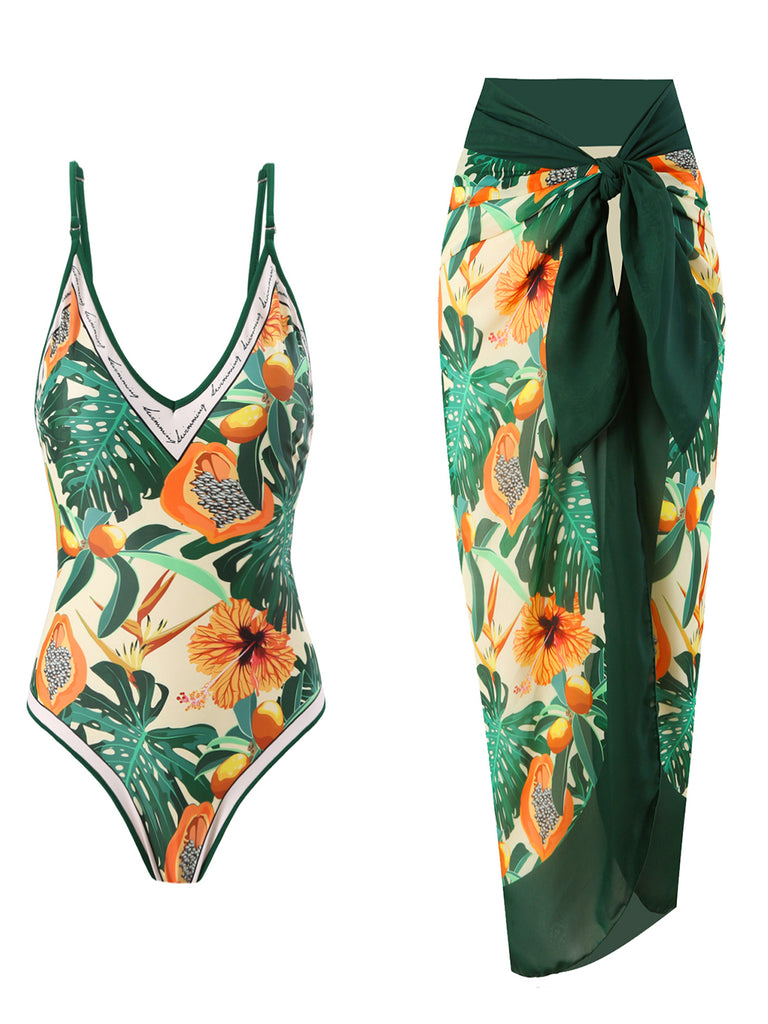 She's wearing 1950s Tropical Print One-Piece Swimsuit & Cover-Up and the whole beach remembers the 1950s