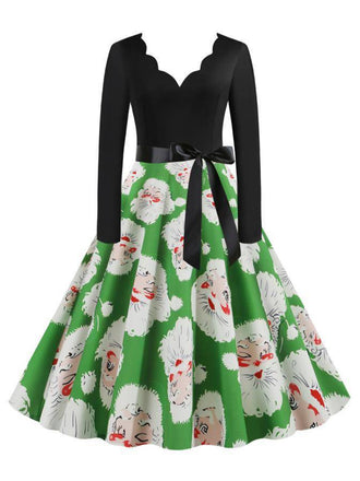 She slips into this 1950s V-Neck Christmas Santa Belted Swing Dress and suddenly it's a 1950s daydream
